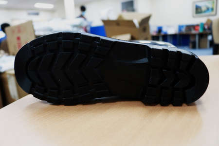 Shoe soles on the table in the store. Selective focus.の写真素材