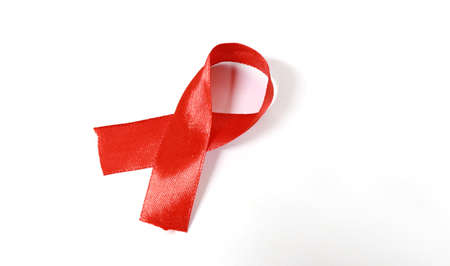 Red ribbon on a white background. World Aids day concept.