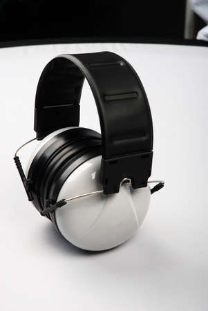 Black and white wireless headphones on a white background.の写真素材