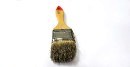 Paint brush on a white background. Close-up, selective focus.の写真素材