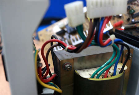 Electronic circuit board with multicolored wires. Electrical equipment.