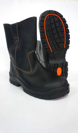 Cool black high boots for daily activities and protect the feet. Workers also wear these shoes as foot protection while working to protect their feet from work accidentsの写真素材