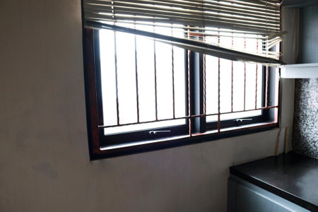 Window with blinds in the house. Interior of the room.