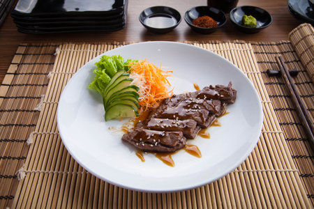 Teriyaki Japanese-style food, where the food is heated or grilled and coated with soy sauce, sake, mirin, flavored sugar which is then called Teriyaki sauce.の写真素材