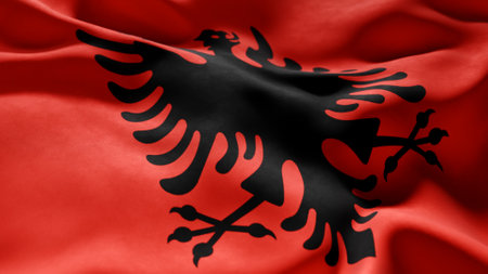 Close-up of Waving Albania flag, suitable for patriotic designs, Independence Day celebrations, or travel materialsの写真素材