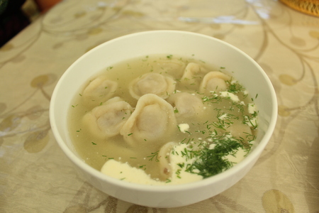 Meat dumplings with crushed herbs on top.の写真素材