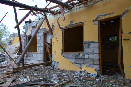 War crime. Civil buildings damaged by the missile launched by Armenia. Barda city, Azerbaijan: 10...