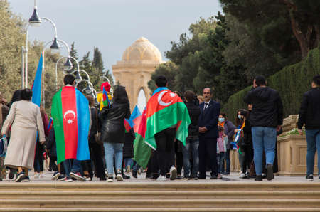 Karabakh Victory Day in Azerbaijan. People with Azerbaijan and Turkish flags. Baku - Azerbaijan: 10...