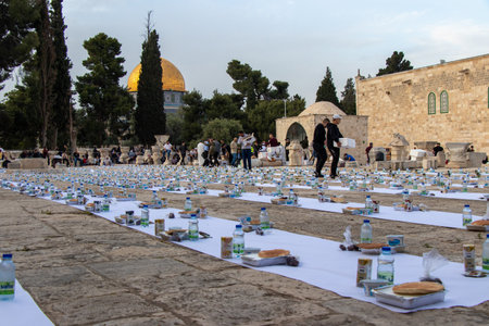 Ramadan in Jerusalem - Palestine: 22 April 2022. preparation to iftar. Muslims break their fast at the yard of the Al-Aqsa Mosque.のeditorial素材