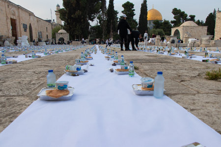 Ramadan in Jerusalem - Palestine: 22 April 2022. preparation to iftar. Muslims break their fast at the yard of the Al-Aqsa Mosque.のeditorial素材