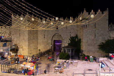 Ramadan nights in Jerusalem. Damascus Gate of the old city of Jerusalem - Israel: 21 April 2022.のeditorial素材