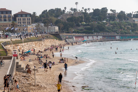 Tel Aviv - Yafo: April 23, 2022. People are resting in Jaffa Beach.のeditorial素材