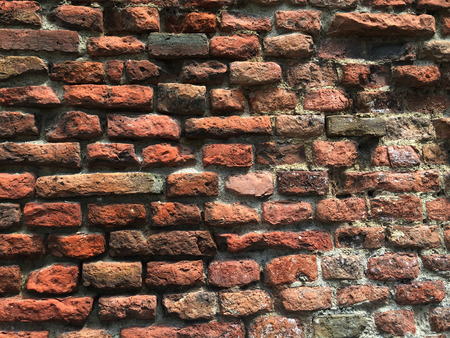 Aged brick wall, stone antique background, textureの写真素材