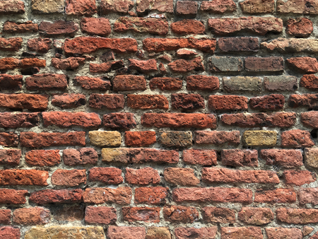 Aged brick wall, stone antique background, textureの写真素材