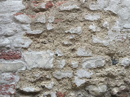 Aged brick wall, stone antique background, textureの写真素材