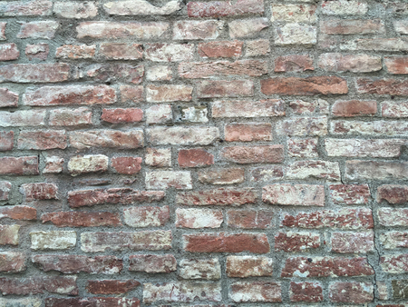 Aged brick wall, stone antique background, textureの写真素材