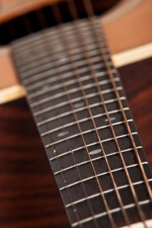 Wooden Acoustic guitar isolated on white background