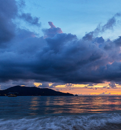 Beautiful seascape at sunset with dramatic clouds and sea.の写真素材