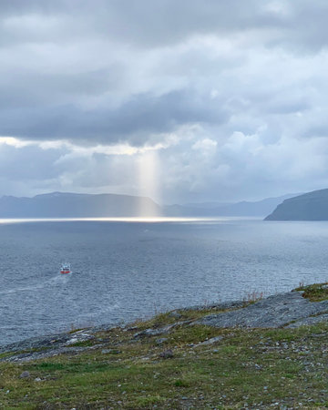 Rainbow over the fjord in northern Norway, Scandinaviaの写真素材