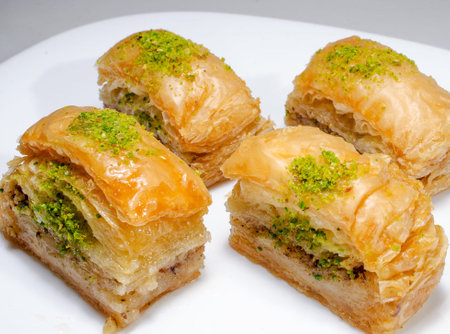Baklava with pistachio on a white background.の写真素材