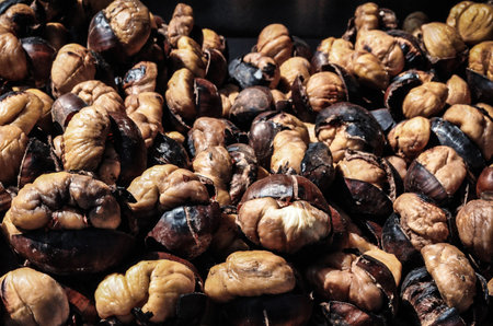 Dried chestnuts in the market. Selective focus. Toned.の写真素材