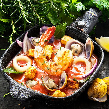 Seafood soup with shrimps, clams and musselsの写真素材