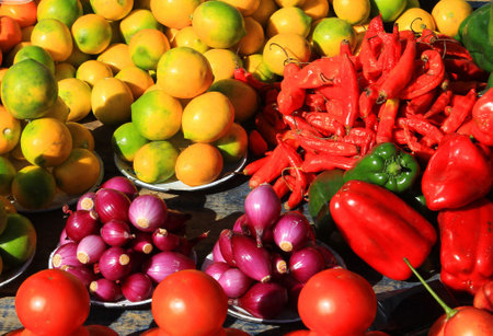 Variety of vegetables and fruits for sale at a market in India