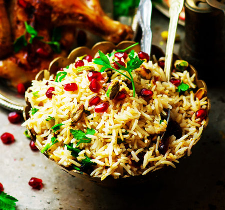 Rice with chicken and pomegranate seeds. selective focusの写真素材