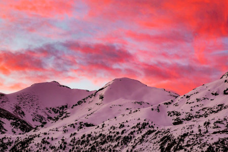 Snowy mountain peaks at sunset. Caucasus Mountains, Georgia, region Gudauri.の写真素材