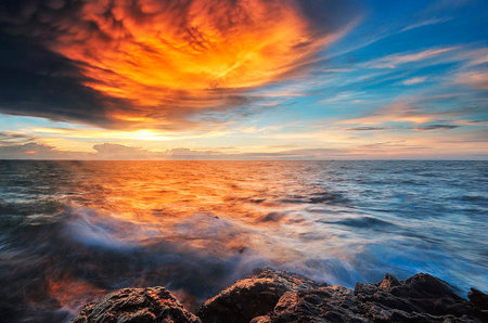 Beautiful seascape at sunset. Dramatic cloudscape over the sea.