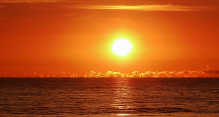 Beautiful sunset over the sea. Sunset over the sea. The sun sets over the sea.