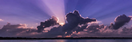 Panoramic view of beautiful sunset over the sea with dramatic clouds