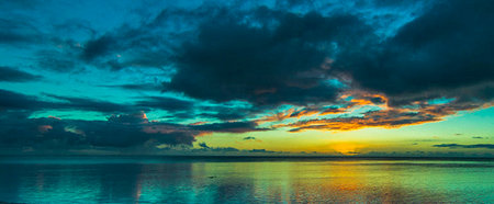 Beautiful sunset over the sea in the tropics. Panorama