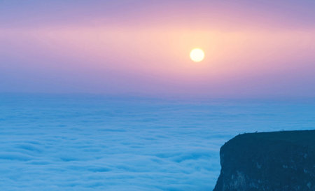 Sunrise over the sea of fog at Phu Chi Fa, Chiang Rai, Thailand