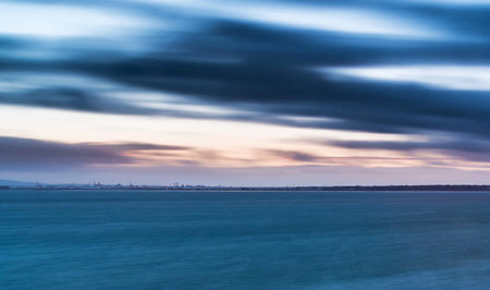 Sunset over the Baltic Sea in winter, Poland. Long exposure.の写真素材