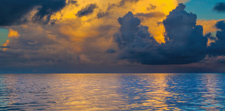 Dramatic sunset over the sea. Panoramic view.