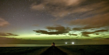 Majestic starry sky over the sea. Long exposure photograph.の写真素材