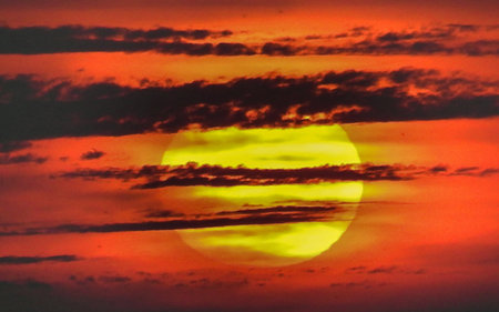 Beautiful sunset sky with clouds background. Sky with clouds and sunの写真素材