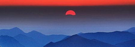 Sunset over the mountains. Panoramic view of the mountains.