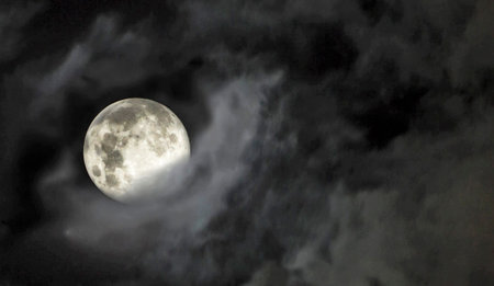 The full moon in the night sky in clouds 3D illustration.