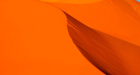 Abstract background of orange sand dunesの写真素材