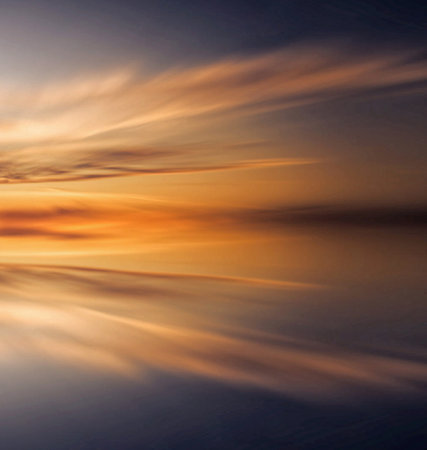 beautiful sunset reflected in the water of the sea. long exposureの写真素材