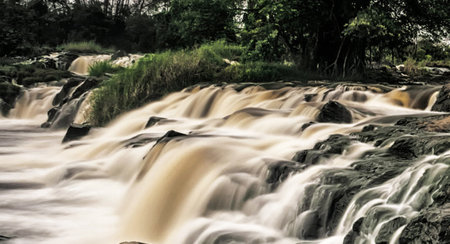 Long exposure of a waterfall in the forest. Long exposure photo.