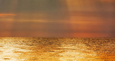 Beautiful sunset over the sea. Nature composition. Toned.の写真素材
