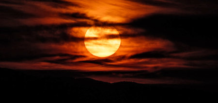Sunset in the mountains and the sky with clouds. Panoramaの写真素材