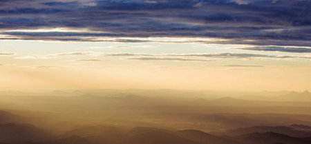 Sunset in the mountains. Panoramic view of the mountains.の写真素材