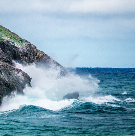 Storm on the sea. Waves crashing against the rocks in the ocean.の写真素材