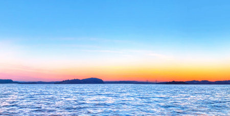 Sunset over the sea in summer. Panoramic view.の写真素材
