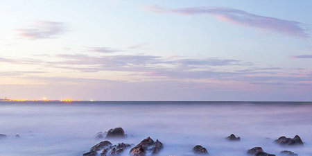 Beautiful seascape at sunset time. Long exposure shot.の写真素材
