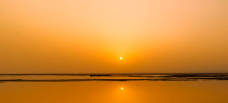 Sunset on the beach, panoramic view of the seaの写真素材
